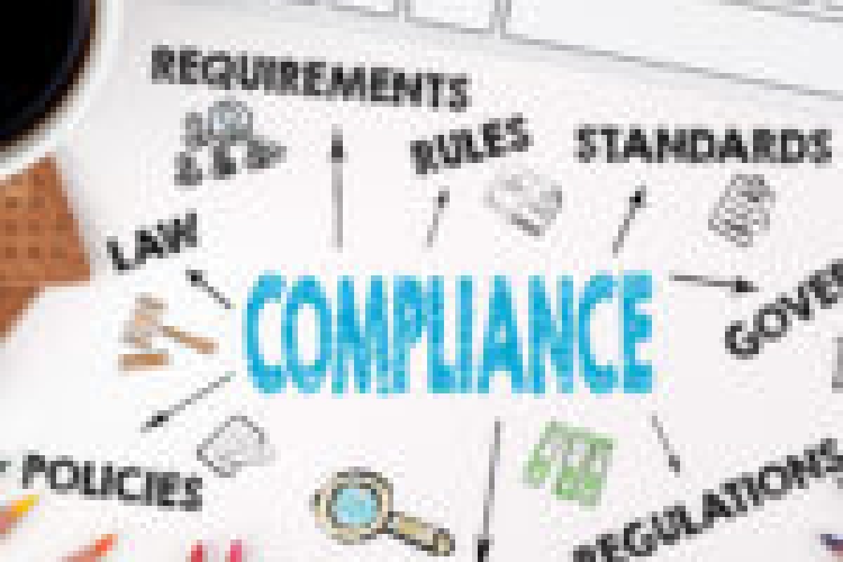 Compliance concept. White office desk